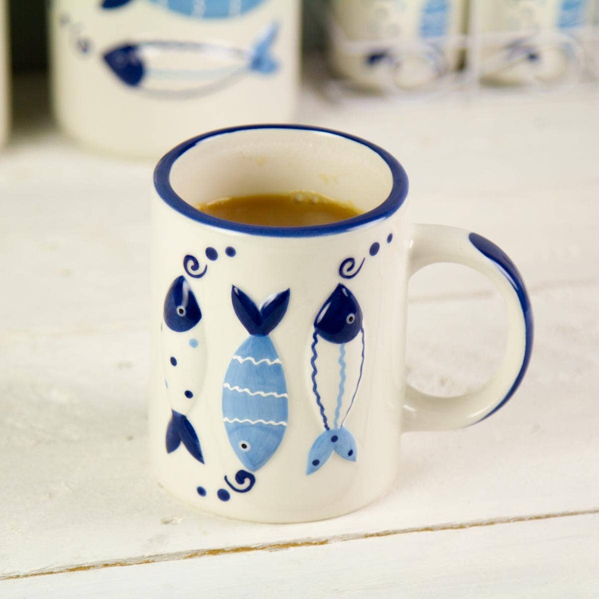 Fish Tales Raised Design Mug