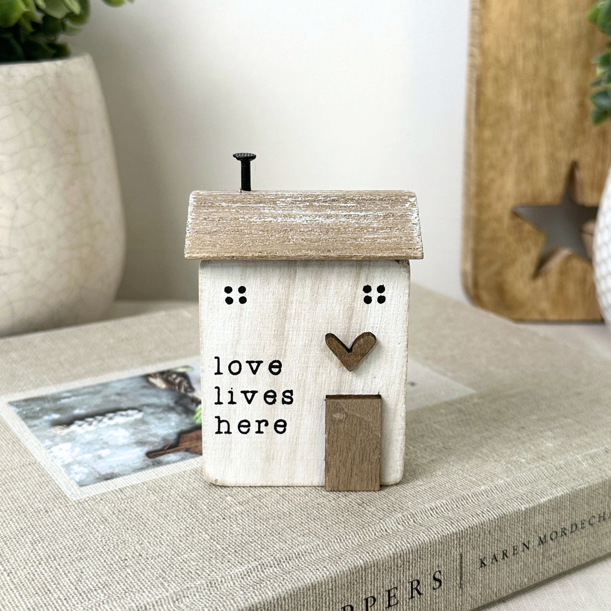 'LOVE LIVES HERE' WOODEN HOUSE
